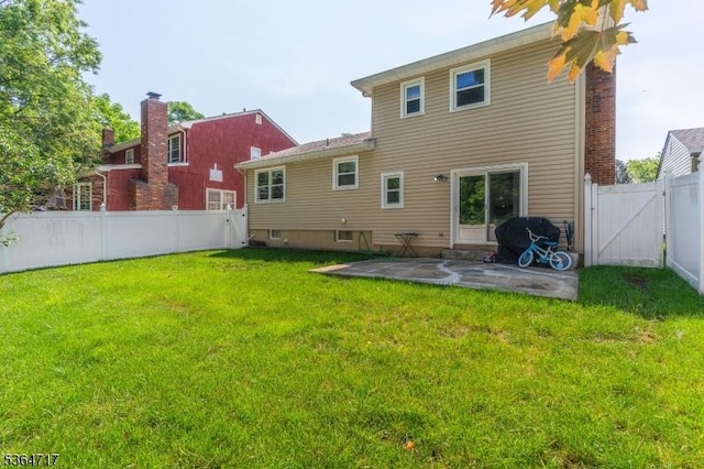 96 Reinhold Ter, Union Twp, NJ 07083 - back of house featuring a patio, a fenced backyard, and a gate