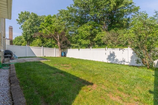 96 Reinhold Ter, Union Twp, NJ 07083 - fenced backyard with a patio area