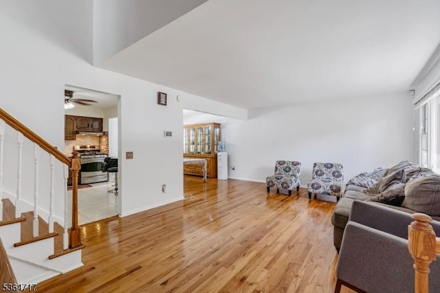 96 Reinhold Ter, Union Twp, NJ 07083 - living area featuring stairs, light wood-type flooring, and ceiling fan