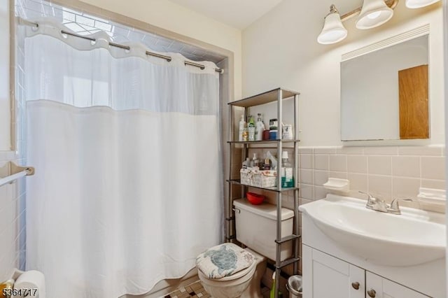 96 Reinhold Ter, Union Twp, NJ 07083 - bathroom with vanity, tile walls, a shower with curtain, and a wainscoted wall