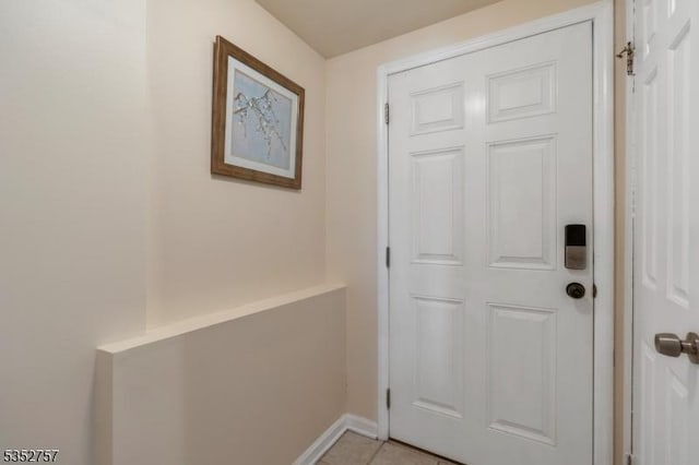 147 Nottingham Sq, Washington Twp, NJ 07840 - doorway with baseboards and light tile patterned floors