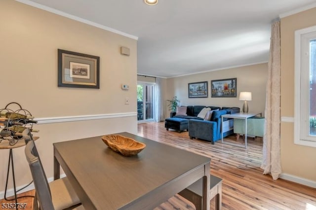 147 Nottingham Sq, Washington Twp, NJ 07840 - dining area featuring crown molding and wood finished floors