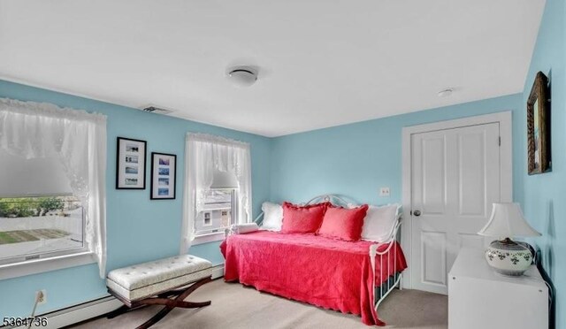 15 Parker St, East Brunswick Twp, NJ 08816 - bedroom featuring carpet floors and a baseboard heating unit