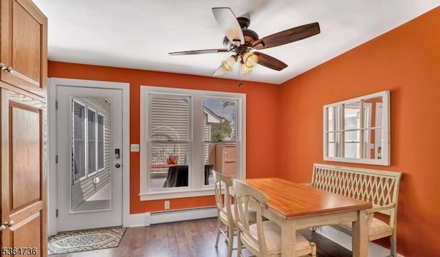 15 Parker St, East Brunswick Twp, NJ 08816 - dining room featuring baseboard heating, wood finished floors, and ceiling fan