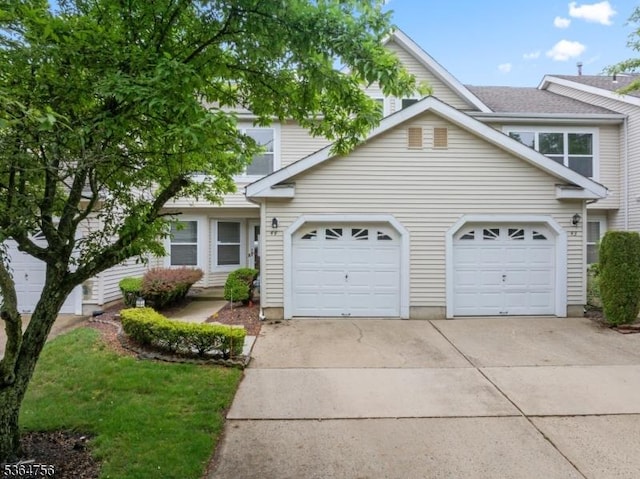 44 Treat Ln, East Brunswick Twp, NJ 08816 - view of front of house with an attached garage and driveway