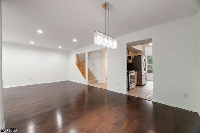 44 Treat Ln, East Brunswick Twp, NJ 08816 - unfurnished living room featuring light wood-style floors, stairs, recessed lighting, and a chandelier