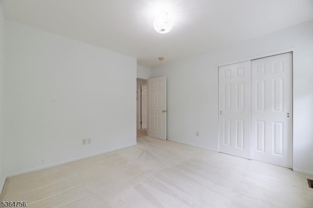 44 Treat Ln, East Brunswick Twp, NJ 08816 - unfurnished bedroom with a closet and baseboards
