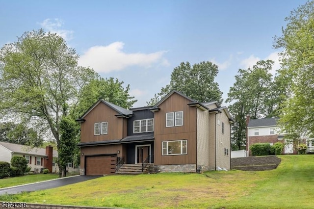 332 Springfield Ave, Westfield Town, NJ 07090 - traditional-style house with a garage, asphalt driveway, and a front yard