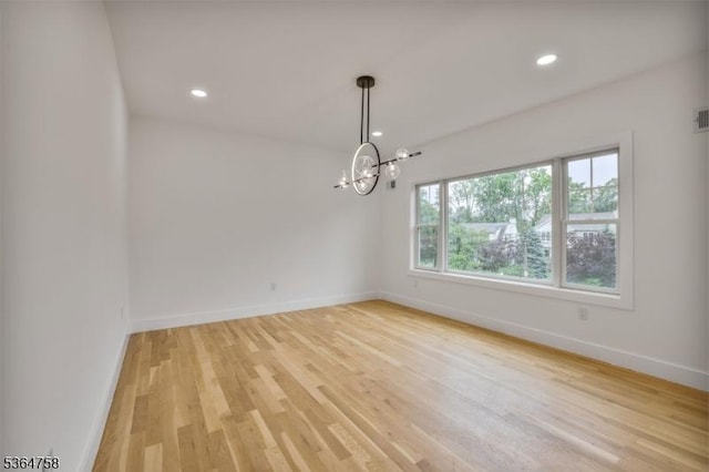 332 Springfield Ave, Westfield Town, NJ 07090 - unfurnished room with a chandelier, light wood-style flooring, and recessed lighting