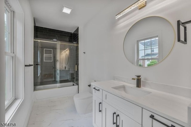 332 Springfield Ave, Westfield Town, NJ 07090 - bathroom featuring vanity, shower / bath combination with glass door, and marble look tiles