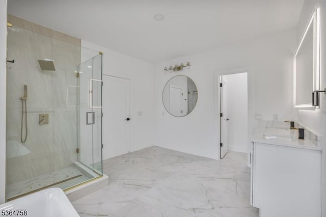 332 Springfield Ave, Westfield Town, NJ 07090 - bathroom featuring a marble finish shower, vanity, a soaking tub, and marble finish floors
