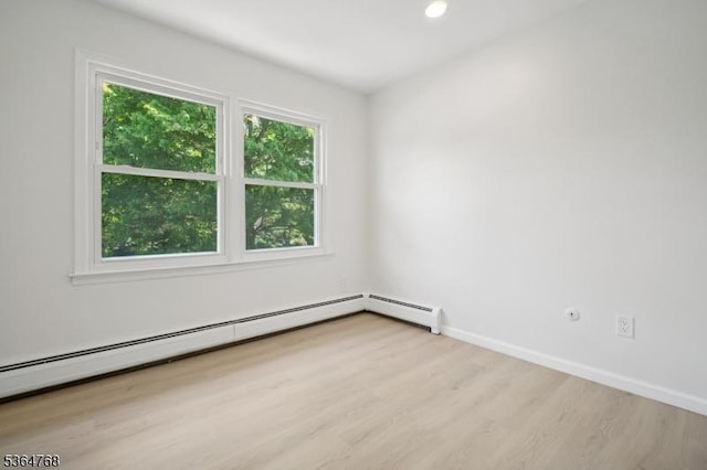 500 Sioux Ave, Parsippany-Troy Hills Twp, NJ 07034 - unfurnished room with light wood finished floors, baseboard heating, and recessed lighting