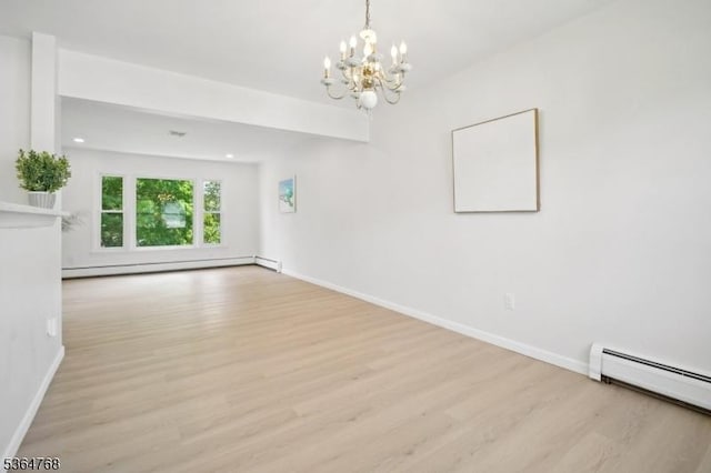 500 Sioux Ave, Parsippany-Troy Hills Twp, NJ 07034 - unfurnished room featuring baseboard heating, a baseboard radiator, light wood-style floors, and a chandelier