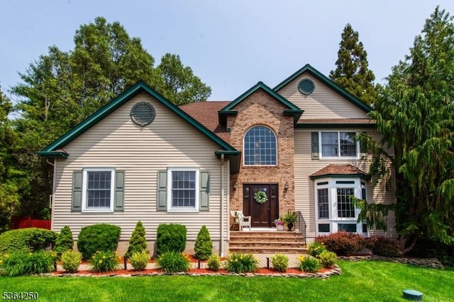 6 Anna Rose Ct, Bloomingdale Boro, NJ 07403 - view of front facade featuring a front lawn