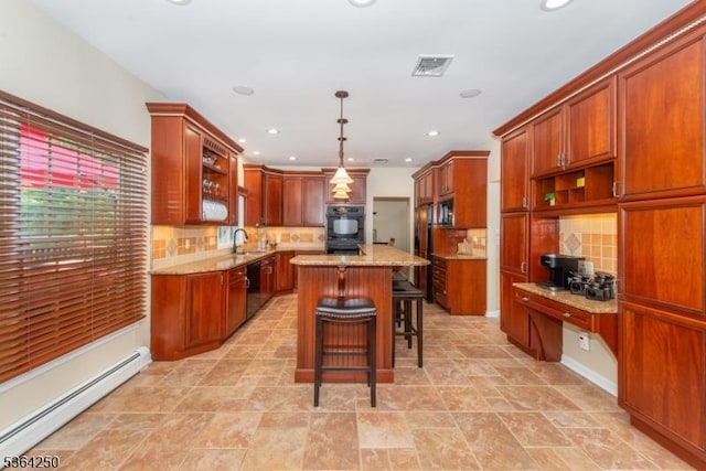 6 Anna Rose Ct, Bloomingdale Boro, NJ 07403 - kitchen featuring baseboard heating, black appliances, a center island, light stone counters, and tasteful backsplash
