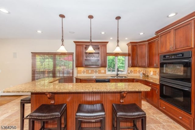 6 Anna Rose Ct, Bloomingdale Boro, NJ 07403 - kitchen featuring tasteful backsplash, recessed lighting, a kitchen island, a breakfast bar, and light stone countertops