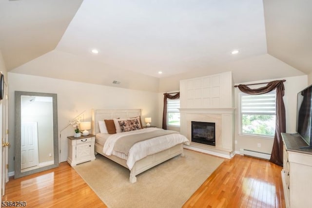 6 Anna Rose Ct, Bloomingdale Boro, NJ 07403 - bedroom with multiple windows, baseboard heating, light wood-type flooring, vaulted ceiling, and recessed lighting