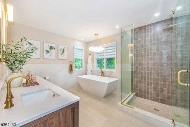 6 Anna Rose Ct, Bloomingdale Boro, NJ 07403 - full bath with tile walls, a stall shower, a freestanding bath, and double vanity
