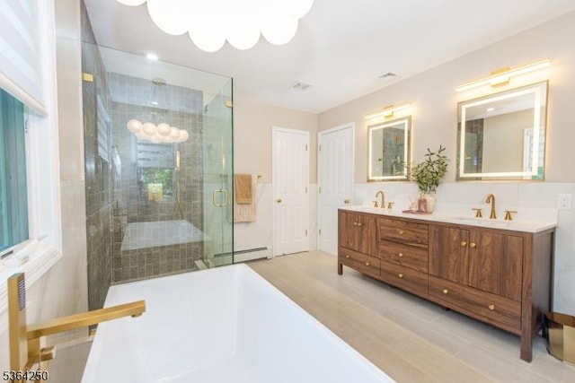 6 Anna Rose Ct, Bloomingdale Boro, NJ 07403 - full bathroom with a freestanding tub, a stall shower, double vanity, and wood finished floors