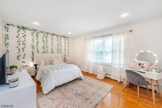 6 Anna Rose Ct, Bloomingdale Boro, NJ 07403 - bedroom featuring a baseboard radiator, light wood-type flooring, and recessed lighting