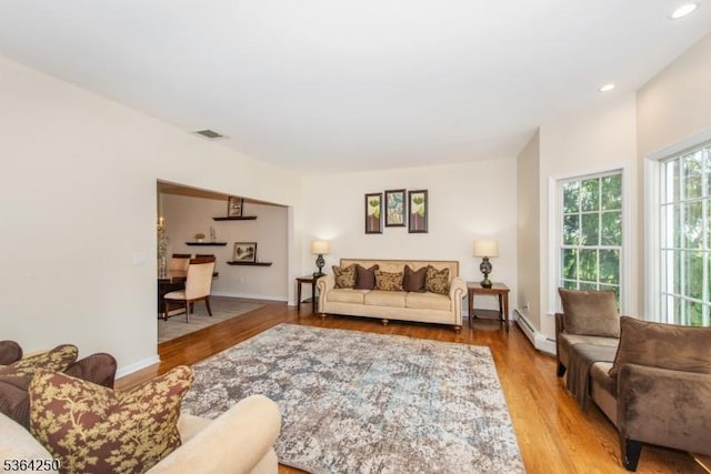 6 Anna Rose Ct, Bloomingdale Boro, NJ 07403 - living area with baseboard heating, wood finished floors, and recessed lighting