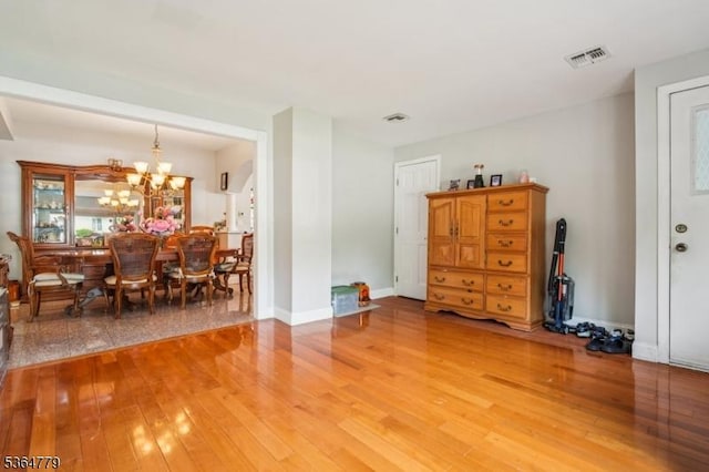 458 Midland Ave, Pompton Lakes Boro, NJ 07442 - dining space featuring light wood-style floors and a chandelier