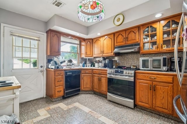 458 Midland Ave, Pompton Lakes Boro, NJ 07442 - kitchen with stainless steel appliances, under cabinet range hood, brown cabinetry, granite floors, and backsplash