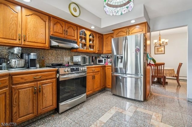 458 Midland Ave, Pompton Lakes Boro, NJ 07442 - kitchen featuring stainless steel appliances, under cabinet range hood, a chandelier, brown cabinetry, and recessed lighting