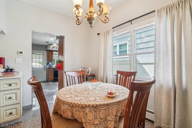 458 Midland Ave, Pompton Lakes Boro, NJ 07442 - dining area featuring a chandelier and a baseboard radiator