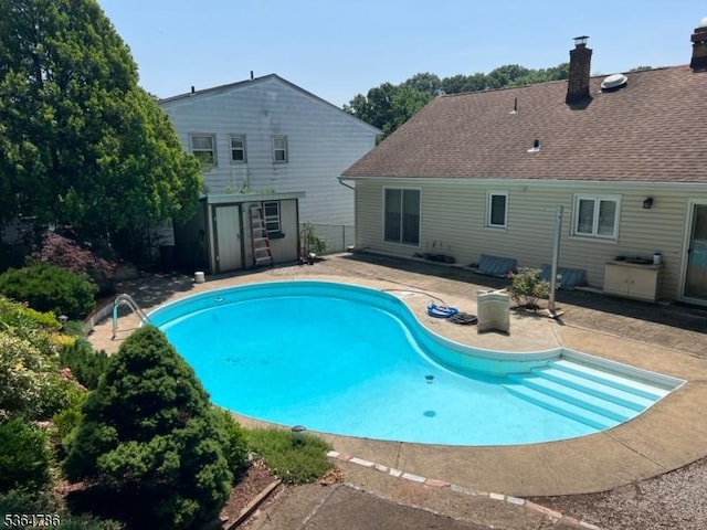 797 Chestnut St, Union Twp, NJ 07083 - swimming pool featuring a patio and a shed