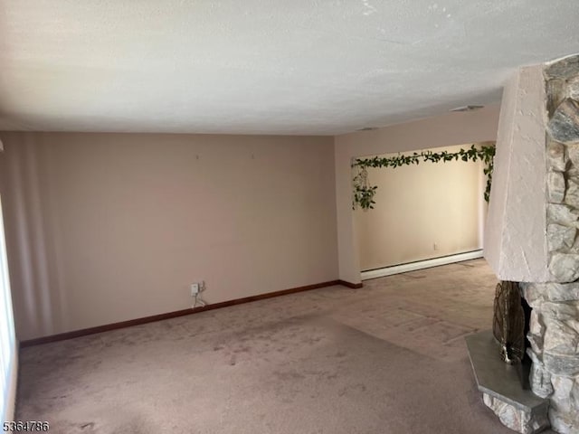 797 Chestnut St, Union Twp, NJ 07083 - empty room with a baseboard radiator, carpet flooring, and a stone fireplace