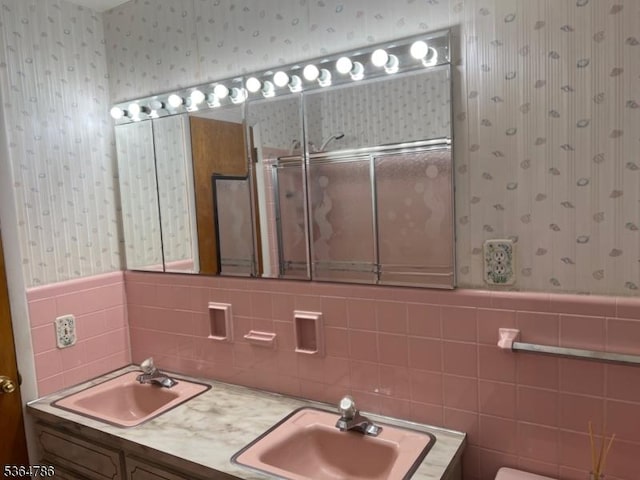 797 Chestnut St, Union Twp, NJ 07083 - bathroom featuring wallpapered walls, double vanity, and an enclosed shower
