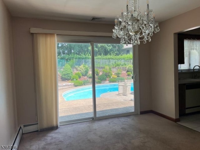 797 Chestnut St, Union Twp, NJ 07083 - unfurnished dining area with carpet flooring and a chandelier