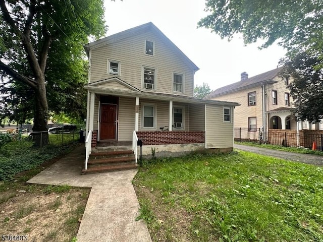 354 E 2nd St, Plainfield City, NJ 07060 - view of front of house with covered porch and brick siding