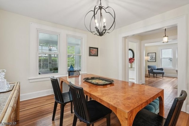 26 Saint Lawrence Ave, Maplewood Twp, NJ 07040 - dining area with a chandelier and wood finished floors