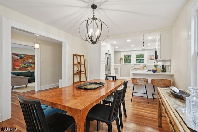 26 Saint Lawrence Ave, Maplewood Twp, NJ 07040 - dining area featuring wood finished floors, a chandelier, and recessed lighting