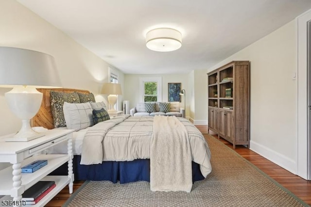 26 Saint Lawrence Ave, Maplewood Twp, NJ 07040 - bedroom with dark wood-style floors and baseboards