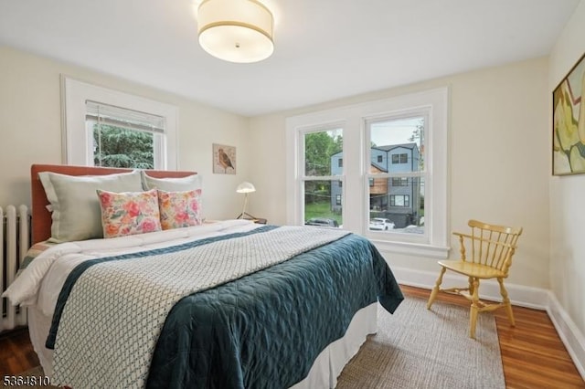 26 Saint Lawrence Ave, Maplewood Twp, NJ 07040 - bedroom with wood finished floors and radiator