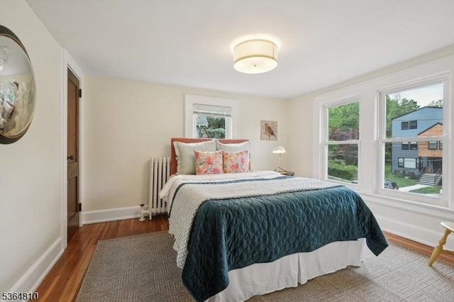 26 Saint Lawrence Ave, Maplewood Twp, NJ 07040 - bedroom featuring radiator and wood finished floors
