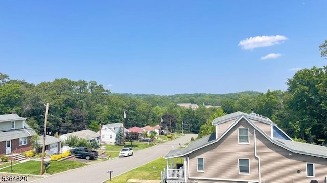 34 School St, North Haledon Boro, NJ 07508 - view of side of property featuring a wooded view