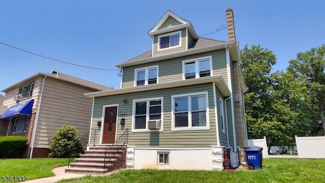 1371 Clinton Ave, Irvington Twp, NJ 07111 - american foursquare style home featuring a chimney, a front lawn, and cooling unit