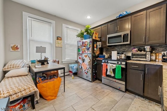 29 Pitt St, Bloomfield Twp, NJ 07003 - kitchen with stainless steel appliances, dark brown cabinets, tasteful backsplash, baseboard heating, and recessed lighting