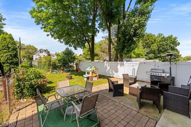 29 Pitt St, Bloomfield Twp, NJ 07003 - fenced backyard featuring outdoor dining area, a patio area, and a grill