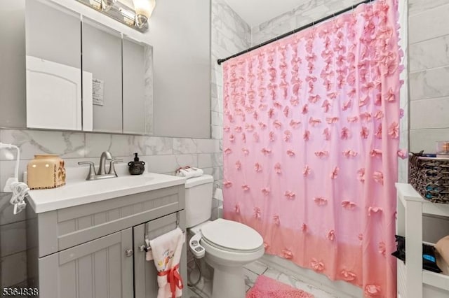 29 Pitt St, Bloomfield Twp, NJ 07003 - full bathroom featuring vanity and tile walls
