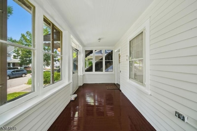 9 Vincent Pl, Montclair Twp, NJ 07042 - unfurnished sunroom featuring healthy amount of natural light and hardwood / wood-style floors