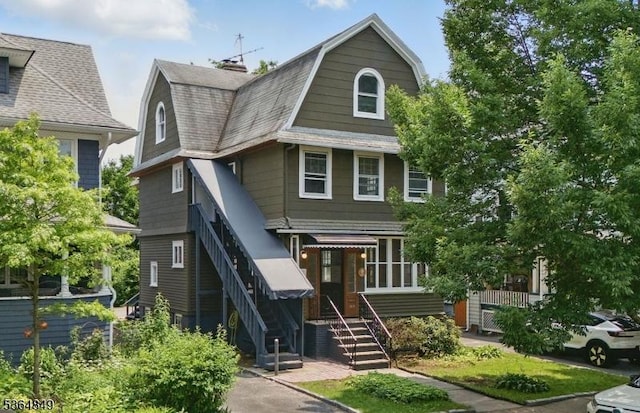 9 Vincent Pl, Montclair Twp, NJ 07042 - view of front facade with a gambrel roof