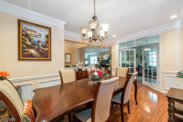 1409 Warrens Way Unit 1409, Wanaque Boro, NJ 07465 - dining room with ornamental molding, a chandelier, wood finished floors, a wainscoted wall, and recessed lighting