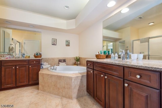 1409 Warrens Way Unit 1409, Wanaque Boro, NJ 07465 - bathroom featuring two vanities, a stall shower, a bath, tile patterned floors, and recessed lighting