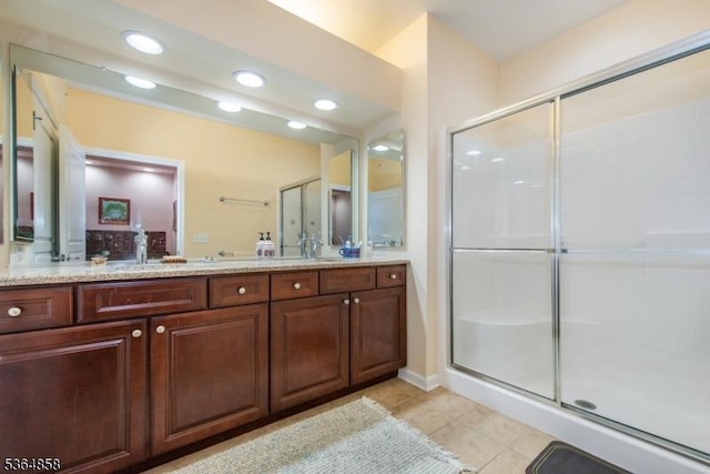 1409 Warrens Way Unit 1409, Wanaque Boro, NJ 07465 - bathroom featuring double vanity, a shower stall, tile patterned flooring, and recessed lighting