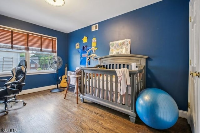 286 Meadow Rd Unit Rt17, Serv Rutherford Boro, NJ 07070 - bedroom with wood finished floors and baseboards